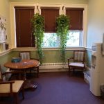 Another common area sitting nook for resident gathering. Plenty of room for playing cards, working on a jigsaw puzzle or playing a game.