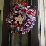 The original front door with a hand-made seasonal wreath
